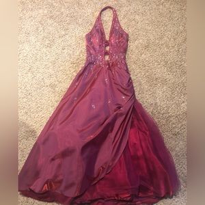 Formal purple/pink dress has been worn twice; wears like new. Size 6.